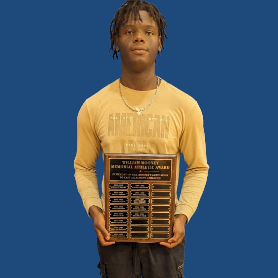  Odha holds plaque where his name will be engraved 
